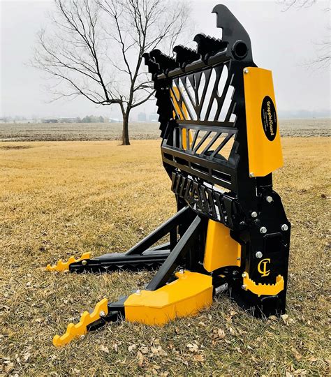 pulling with a skid steer|skid steer tree pullers.